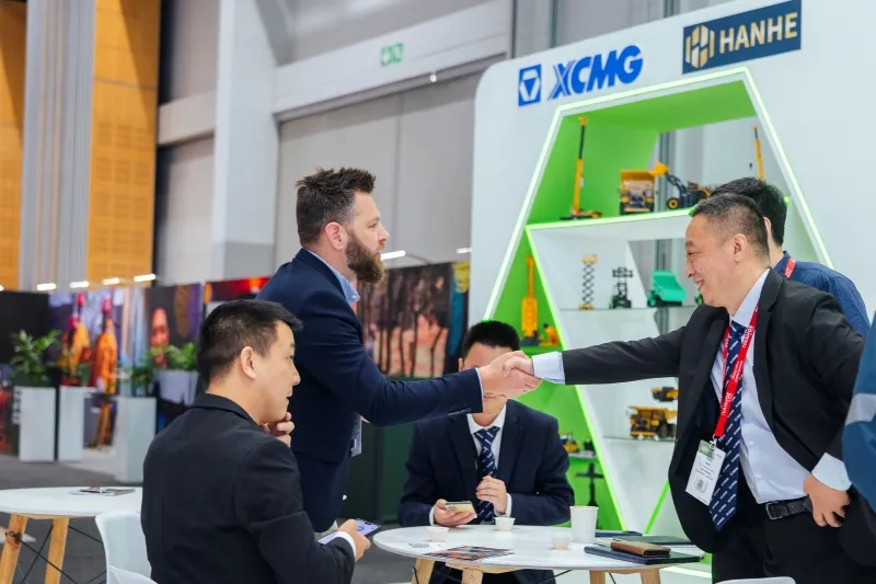 Business meeting at an exhibition stand