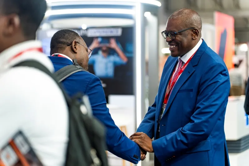 Investor meeting a mining company representative at Mining Indaba