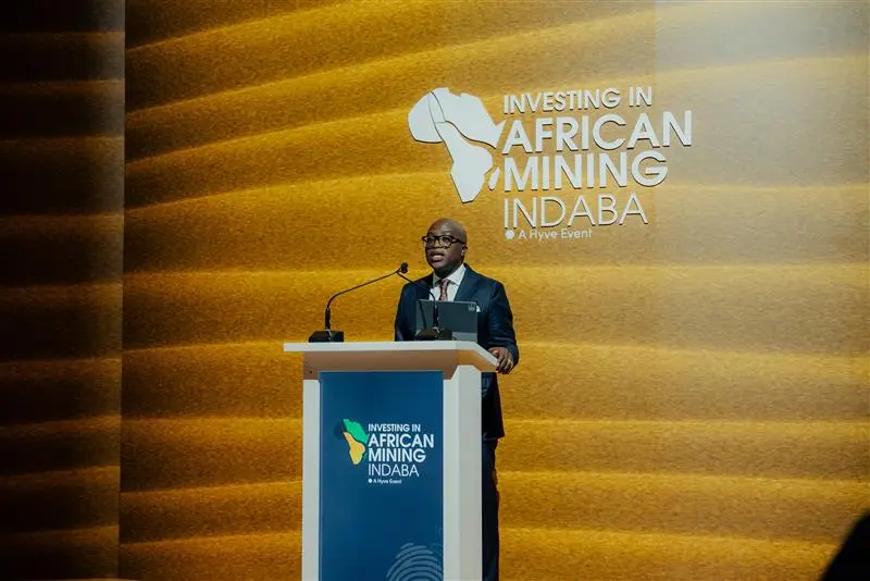 Speaker presenting on governance at Mining Indaba