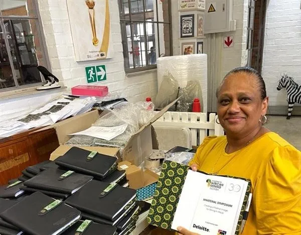 Community members producing reusable bags through a local enterprise